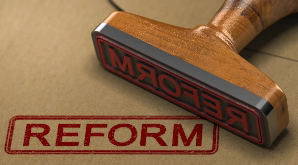 Stamp with reform printed on brown paper