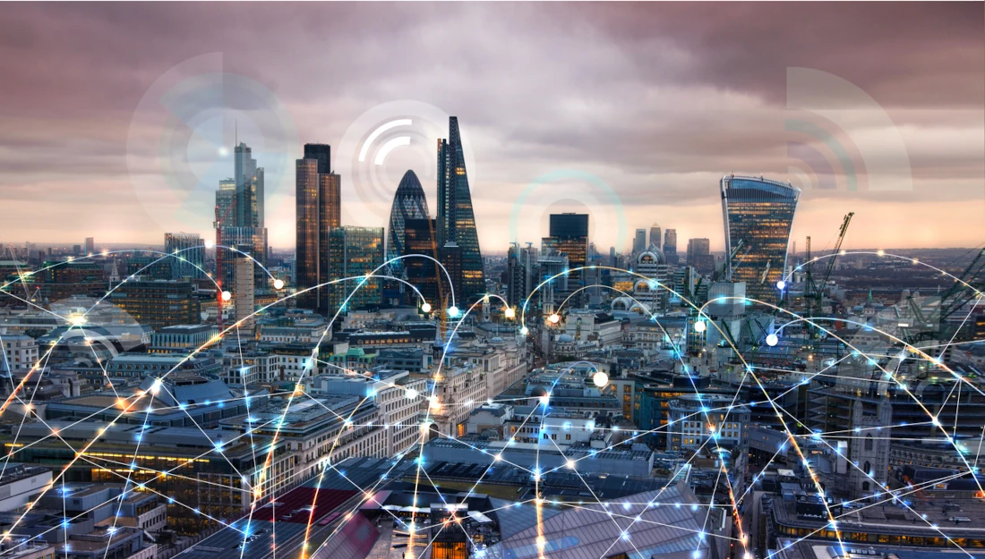 City of London at sunset with tech illustrations.