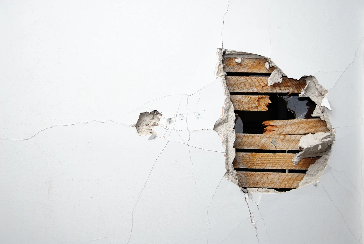 Property damage with a hole in a wall