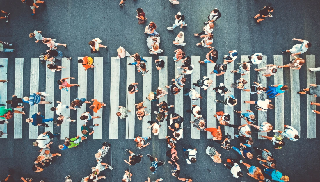 crowd on pedestrian crosswalk.